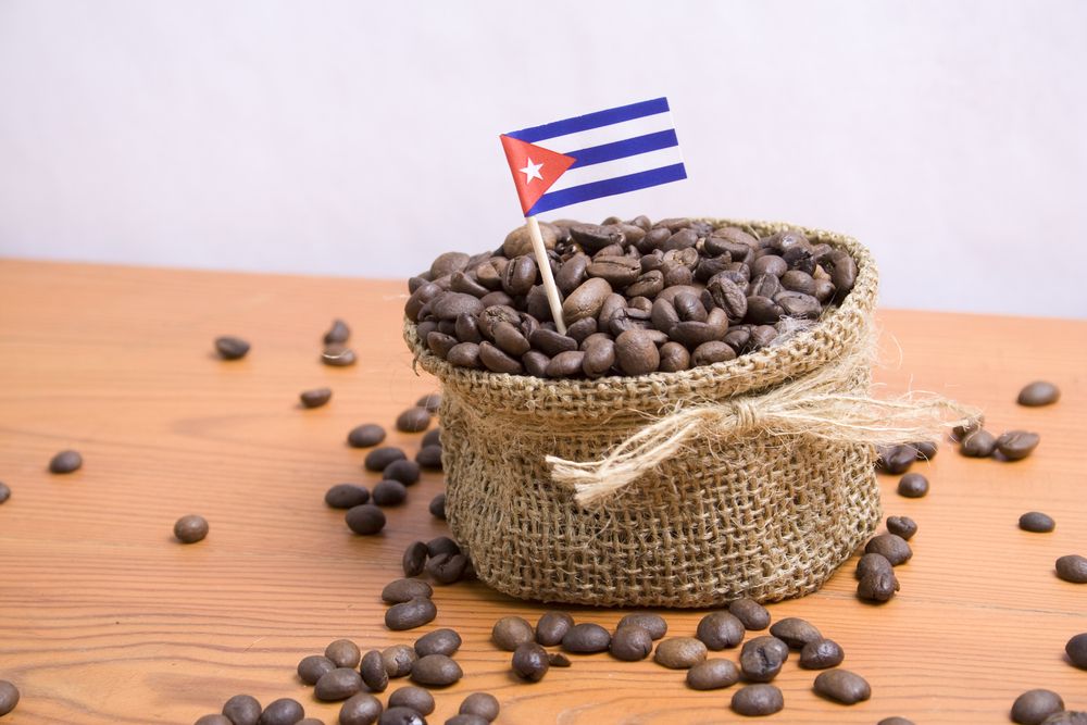 Cuban coffee beans in a canvas bag decorated with the Cuban flag