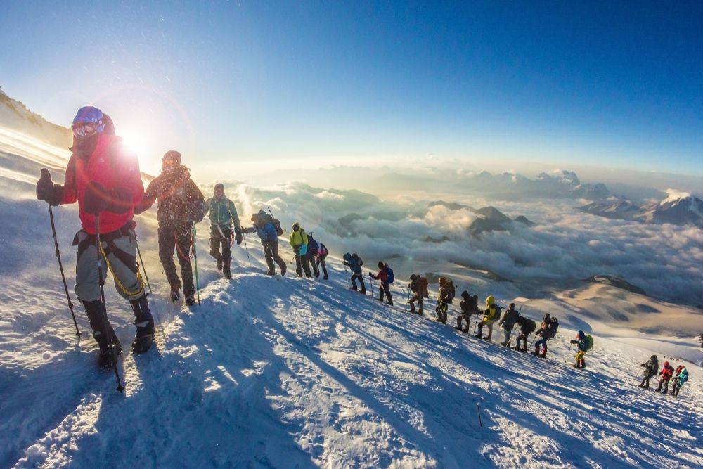 A group of tourists climbing Mount Elbrus